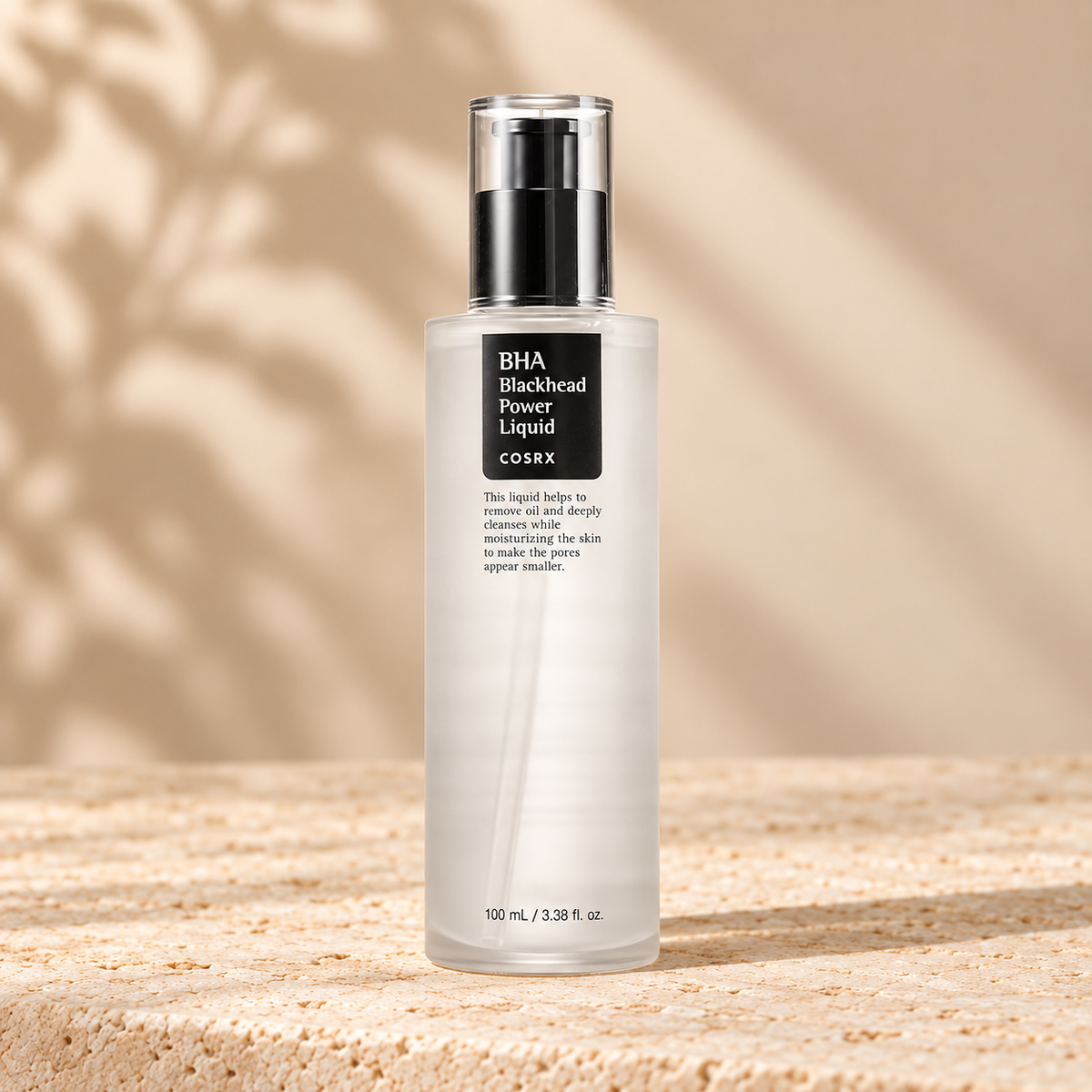COSRX BHA Blackhead Power Liquid 100ml on a warm beige background